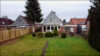 Mehrfamilienhaus kurzfristig komplett frei mit großem Garten - Rückansicht Luftbild