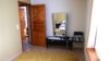 Ebenerdiger Bungalow - tolles Holzhaus mit guten energetischen Eigenschaften - Schlafzimmer zum Flur
