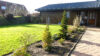 Ebenerdiger Bungalow - tolles Holzhaus mit guten energetischen Eigenschaften - Vorgarten