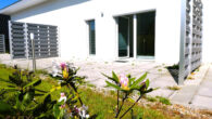 Beispiel Terasse - Kleines Ebenerdiges Reihenhaus mit Garten aus 2021 KFW 85