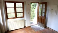 Eingangstür rechts - Refugium: Zweifamilien- Handwerkerhaus auf großem Grundstück in Seenähe